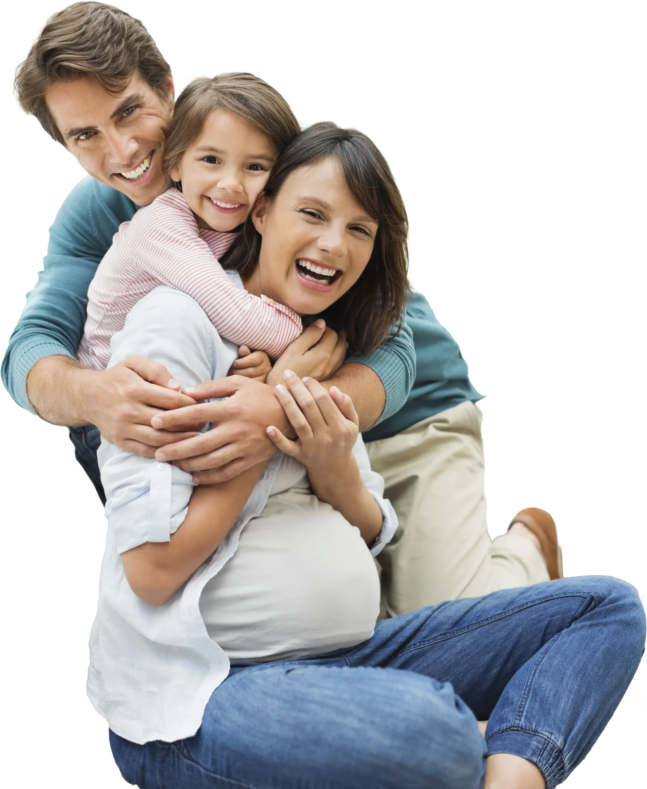 Family hugging and smiling together in living room